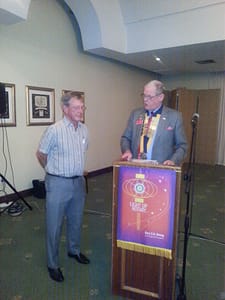 DG Cecil Rose reading rights and responsibilities to Bruce Dietrich
